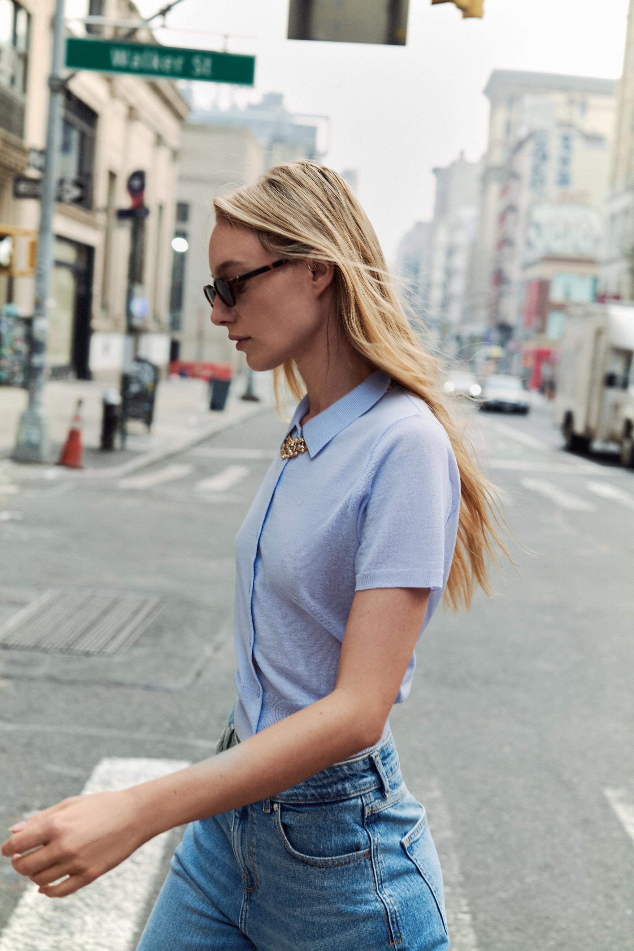 GILET EN MAILLE À MANCHES COURTES